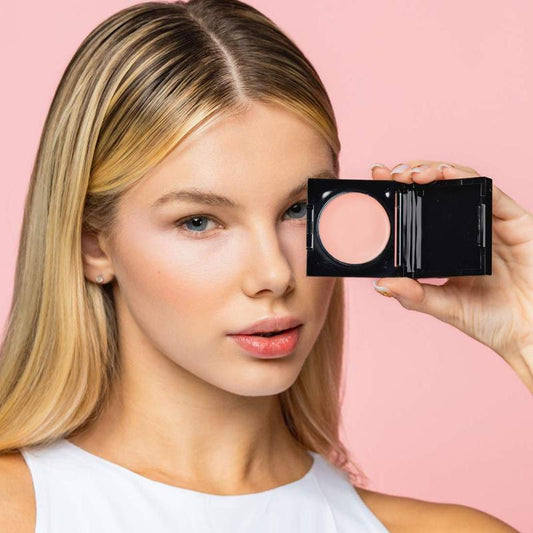 Ögonlysare för att täcka och minska mörka ringar