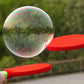 Interaktivt bubbelspel med pingisracket för barn
