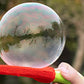 Interaktivt bubbelspel med pingisracket för barn